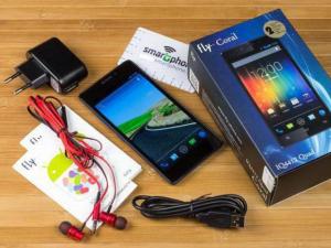 Review of the Fly IQ4412 Coral smartphone: bright, thin, powerful Fly IQ4412 Quad Coral - Review of a blue thin smartphone with red and black headphones